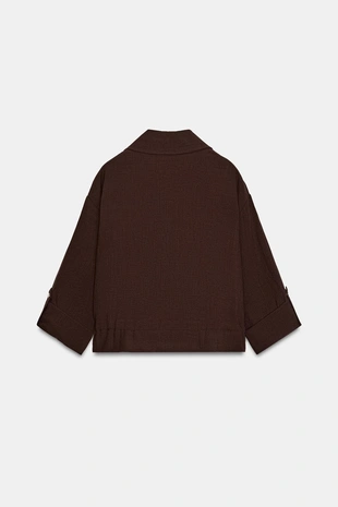 Короткая куртка с подвернутыми рукавами