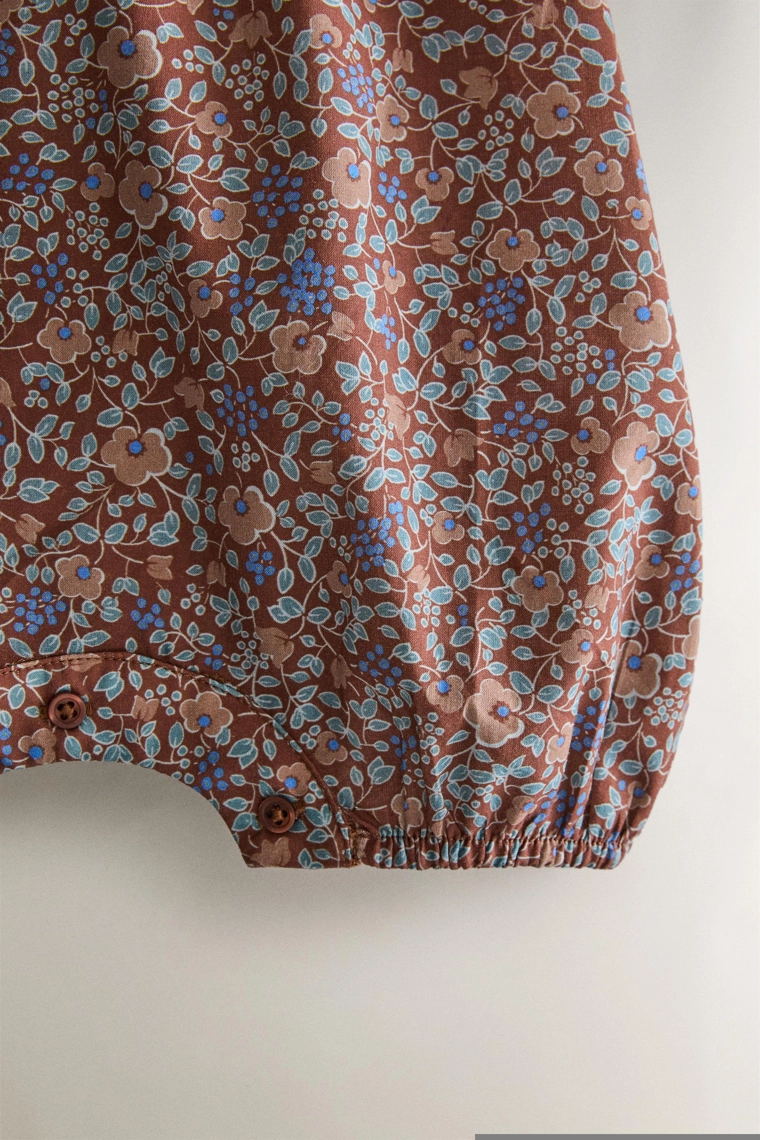 Цветочный комбинезон для пляжа малышей