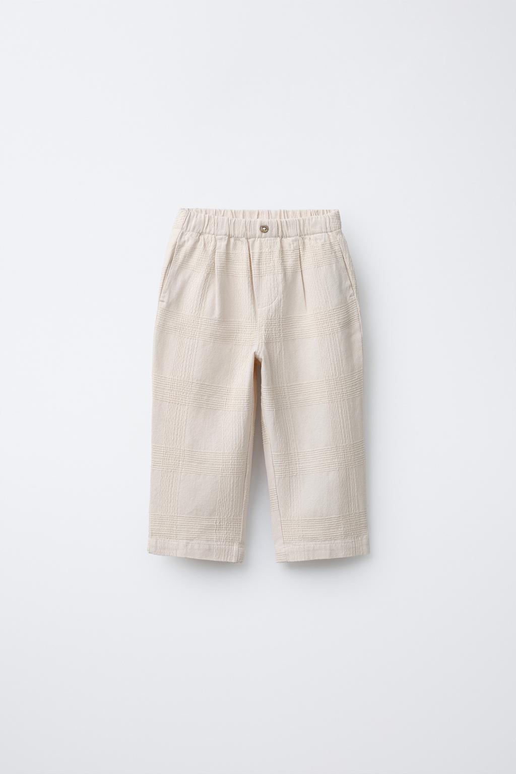 БРЮКИ ИЗ РЕЛЬЕФНОЙ ТКАНИ