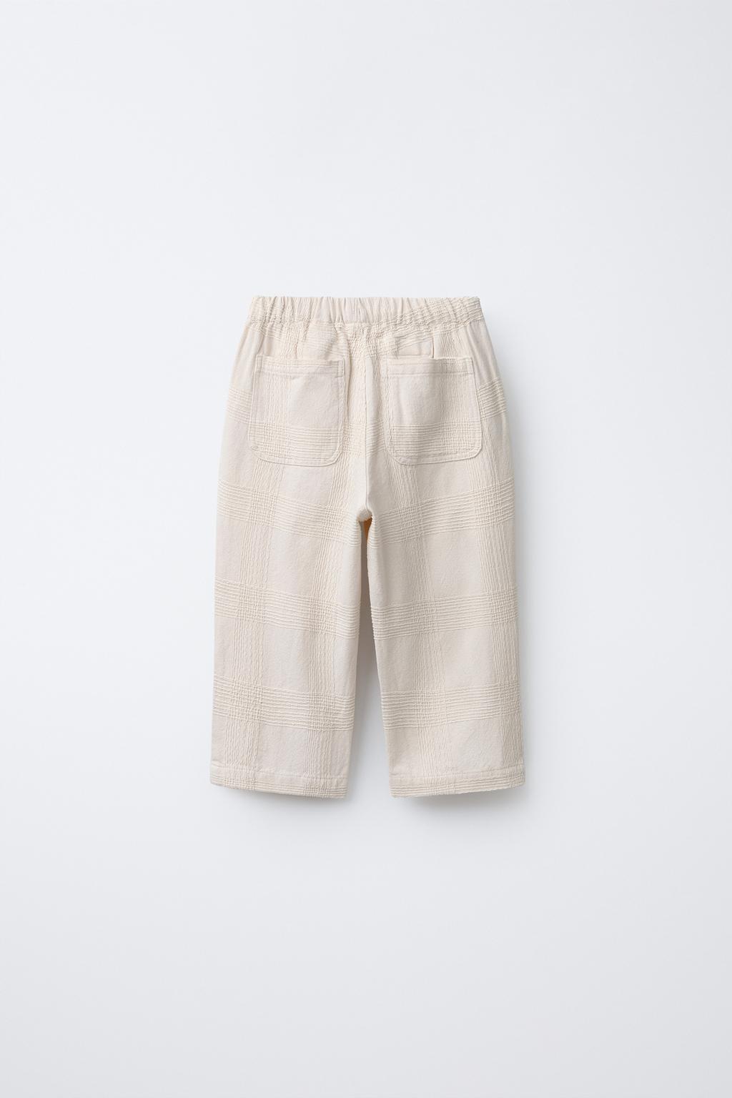 БРЮКИ ИЗ РЕЛЬЕФНОЙ ТКАНИ