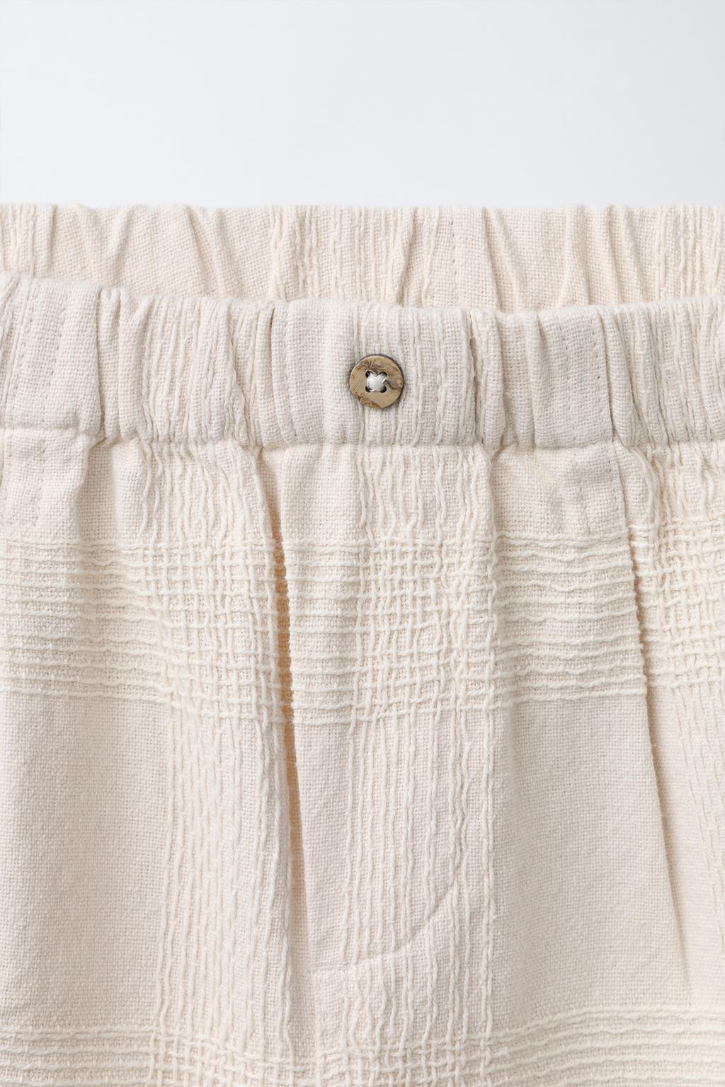 БРЮКИ ИЗ РЕЛЬЕФНОЙ ТКАНИ