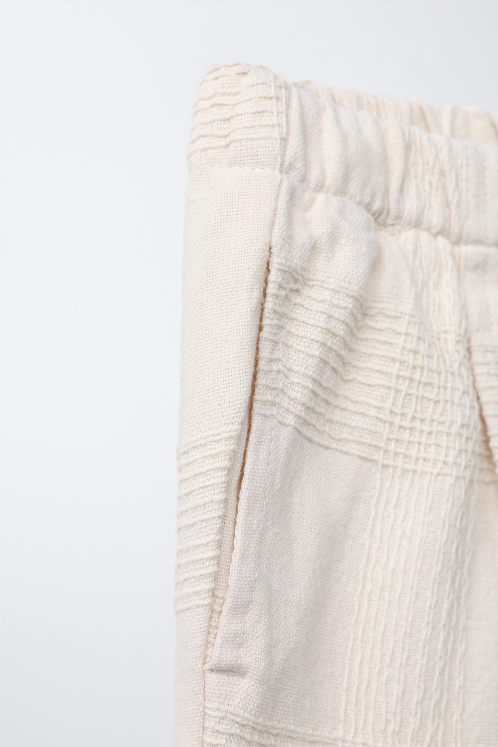 БРЮКИ ИЗ РЕЛЬЕФНОЙ ТКАНИ