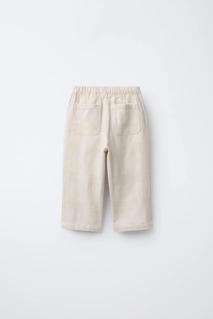 Брюки из рельефной ткани- Заказать в России