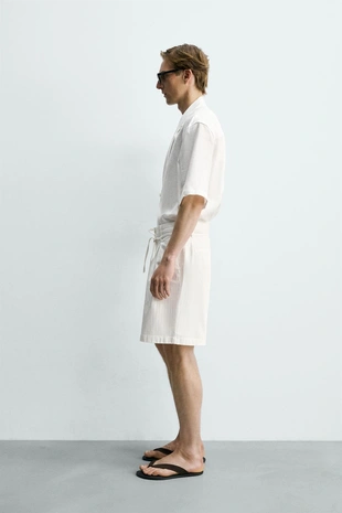 Шорты Relaxed Fit со складками- Заказать в России