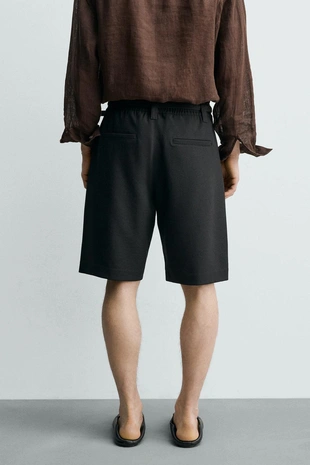 Шорты Relaxed Fit с боковыми складками- Заказать в России