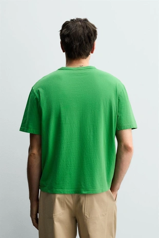 Футболка свободного кроя с карманом- Заказать в России