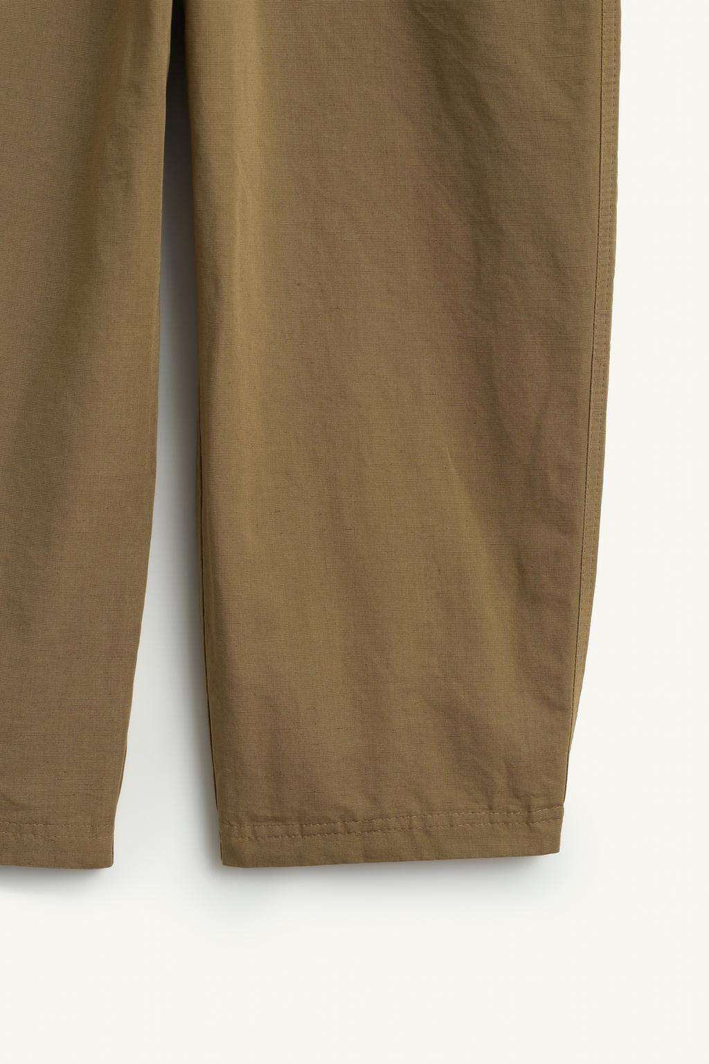 Джинсовый комбинезон с прямым вырезом