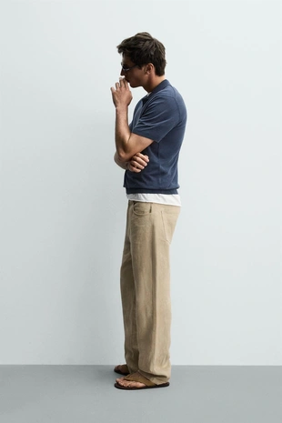 Поло из рельефного трикотажа с эффектом потертости- Заказать в России