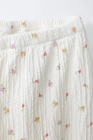 Брюки с цветочным узором и текстурой- Заказать в России