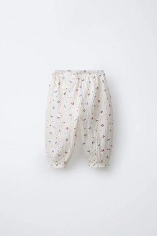 Брюки-джоггеры с цветочным узором- Заказать в России