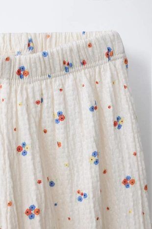 Брюки-джоггеры с цветочным узором- Заказать в России