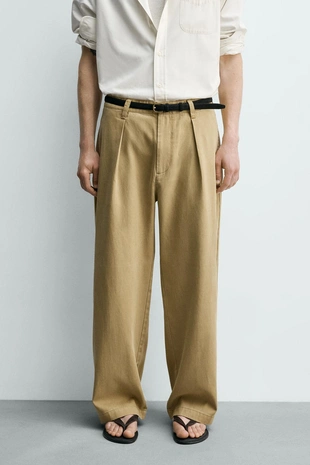 Брюки из лиоцелла и хлопка со складками- Заказать в России