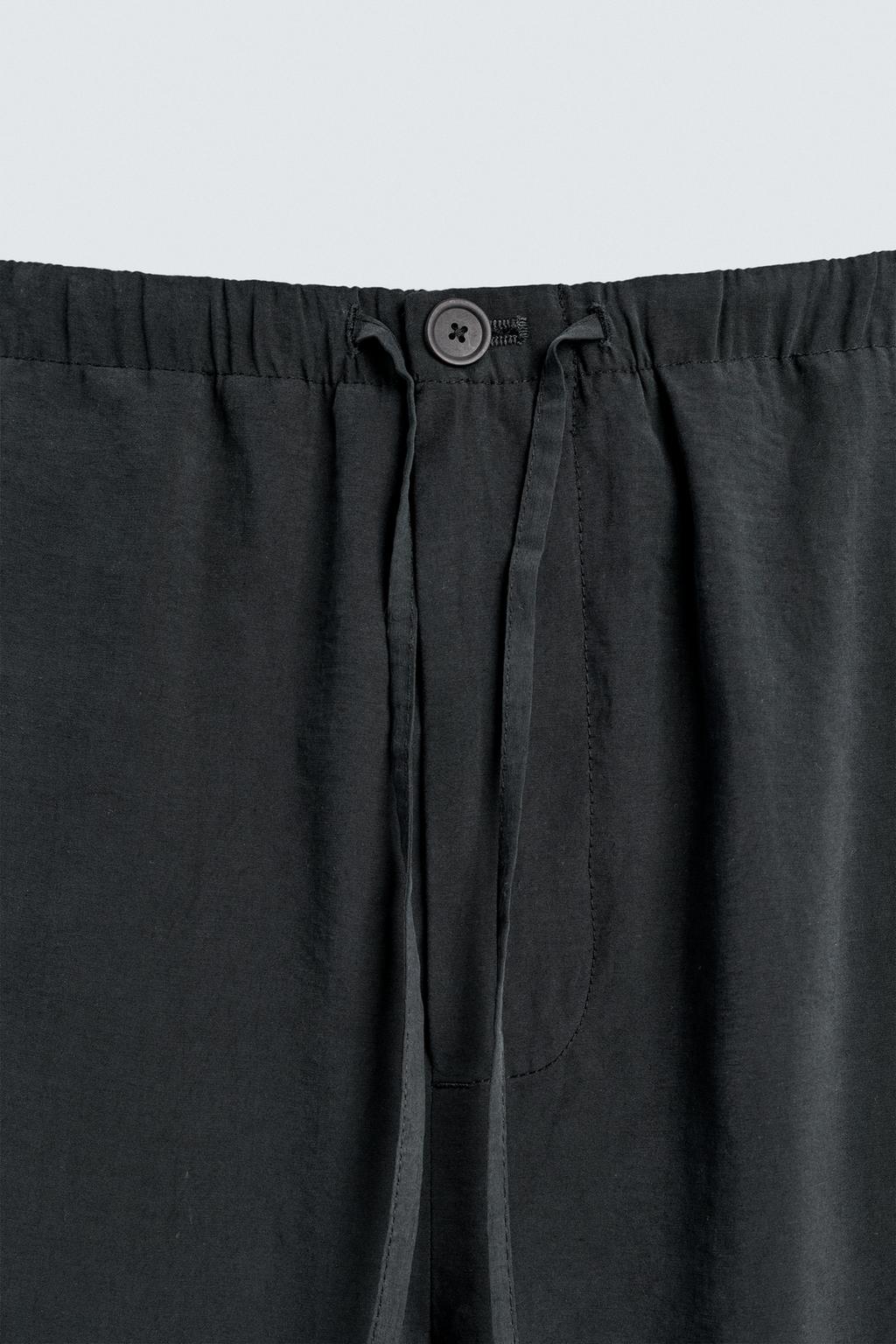 БРЮКИ RELAXED FIT ИЗ СТРУЯЩЕЙСЯ ТКАНИ