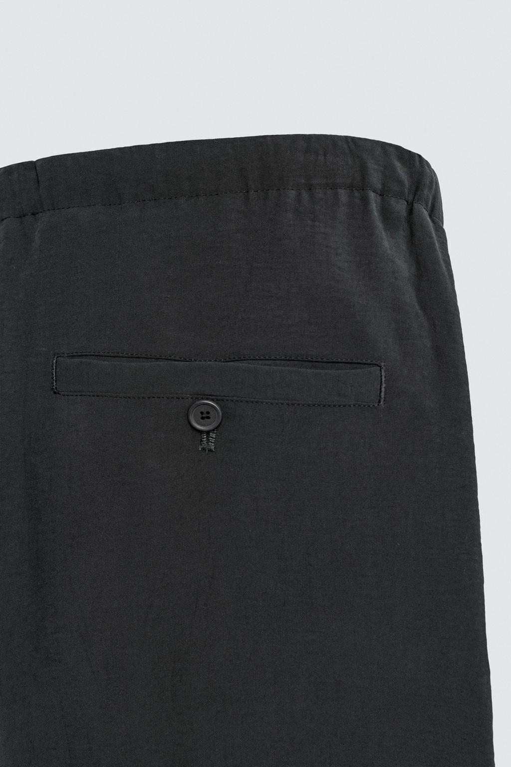 БРЮКИ RELAXED FIT ИЗ СТРУЯЩЕЙСЯ ТКАНИ