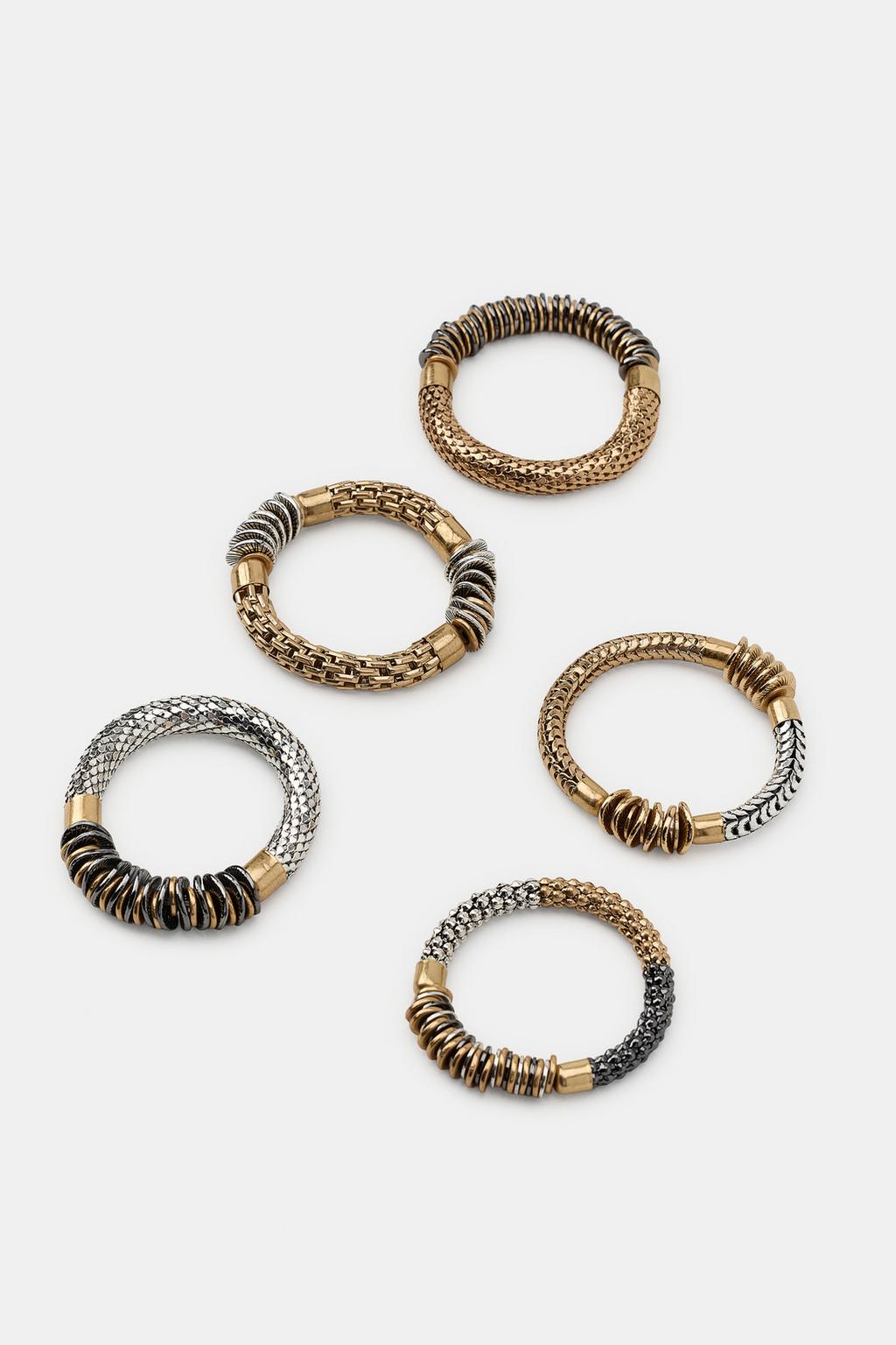 НАБОР ИЗ 5 ЭЛАСТИЧНЫХ БРАСЛЕТОВ С МЕТАЛЛИЧЕСКИМИ ДЕТАЛЯМИ