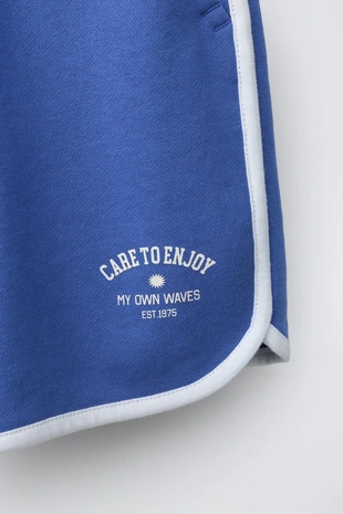 Шорты-джоггеры с контрастной отделкой- Заказать в России