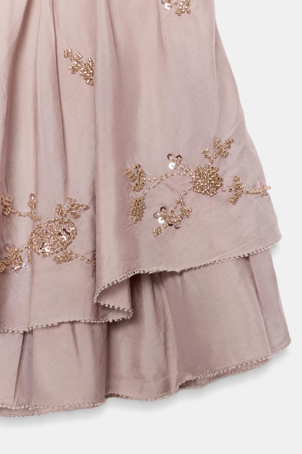 МИНИ-ЮБКА С ВОЛАНАМИ И БУСИНАМИ