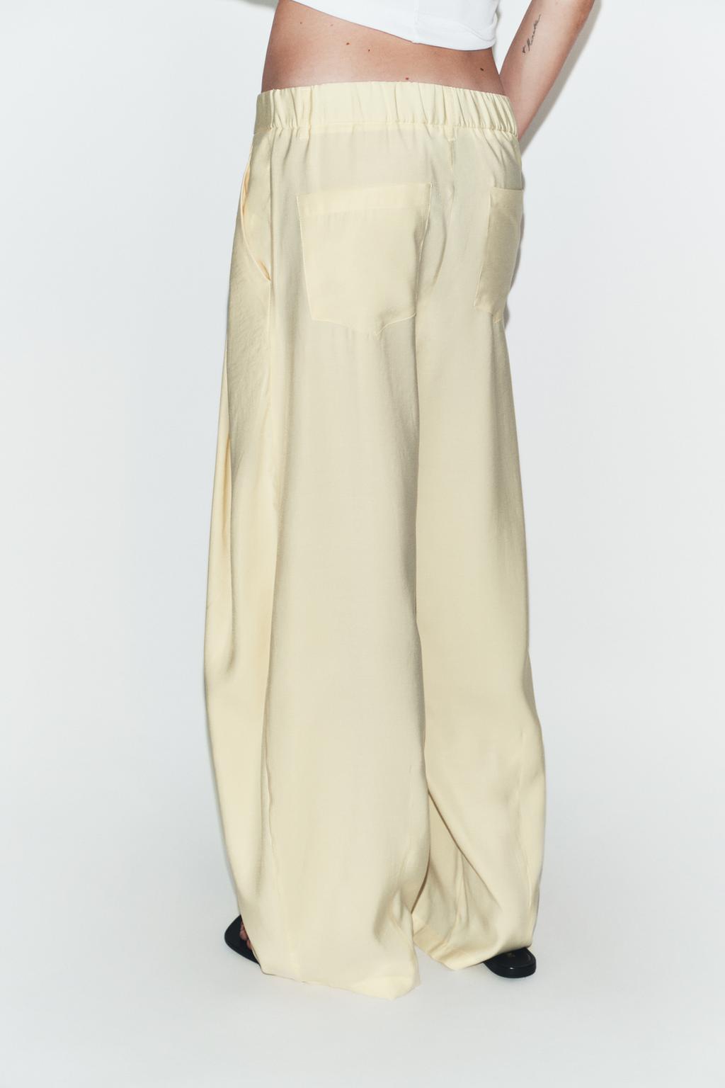 СТРУЯЩИЕСЯ БРЮКИ СО СКЛАДКАМИ