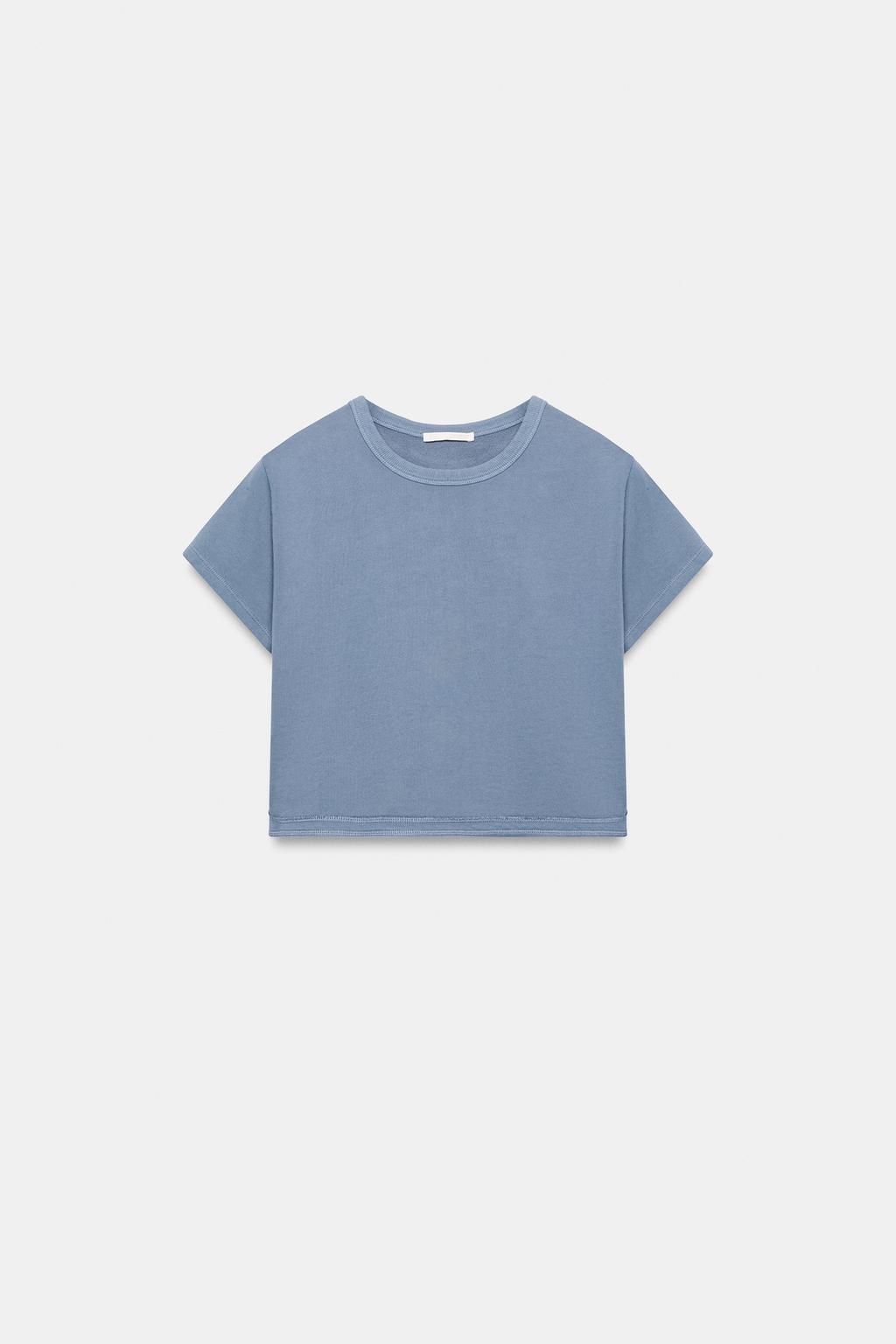 КОРОТКАЯ ФУТБОЛКА С ЭФФЕКТОМ ПОТЕРТОСТИ