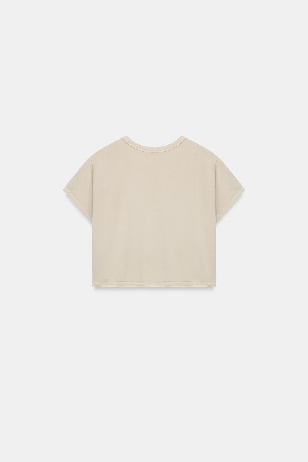 УКОРОЧЕННАЯ ФУТБОЛКА С ЭФФЕКТОМ ПОТЕРТОСТИ