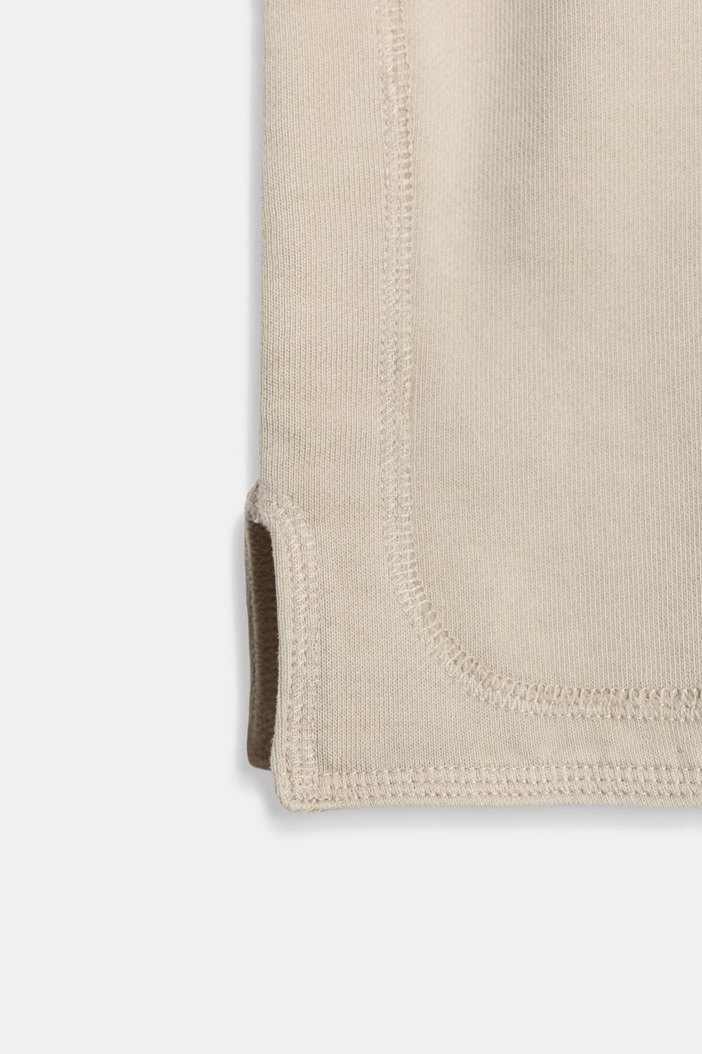 УКОРОЧЕННАЯ ФУТБОЛКА С ЭФФЕКТОМ ПОТЕРТОСТИ