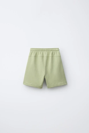 Однотонные шорты из мягкой ткани- Заказать в России