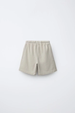 Шорты из мягкой ткани с этикеткой- Заказать в России