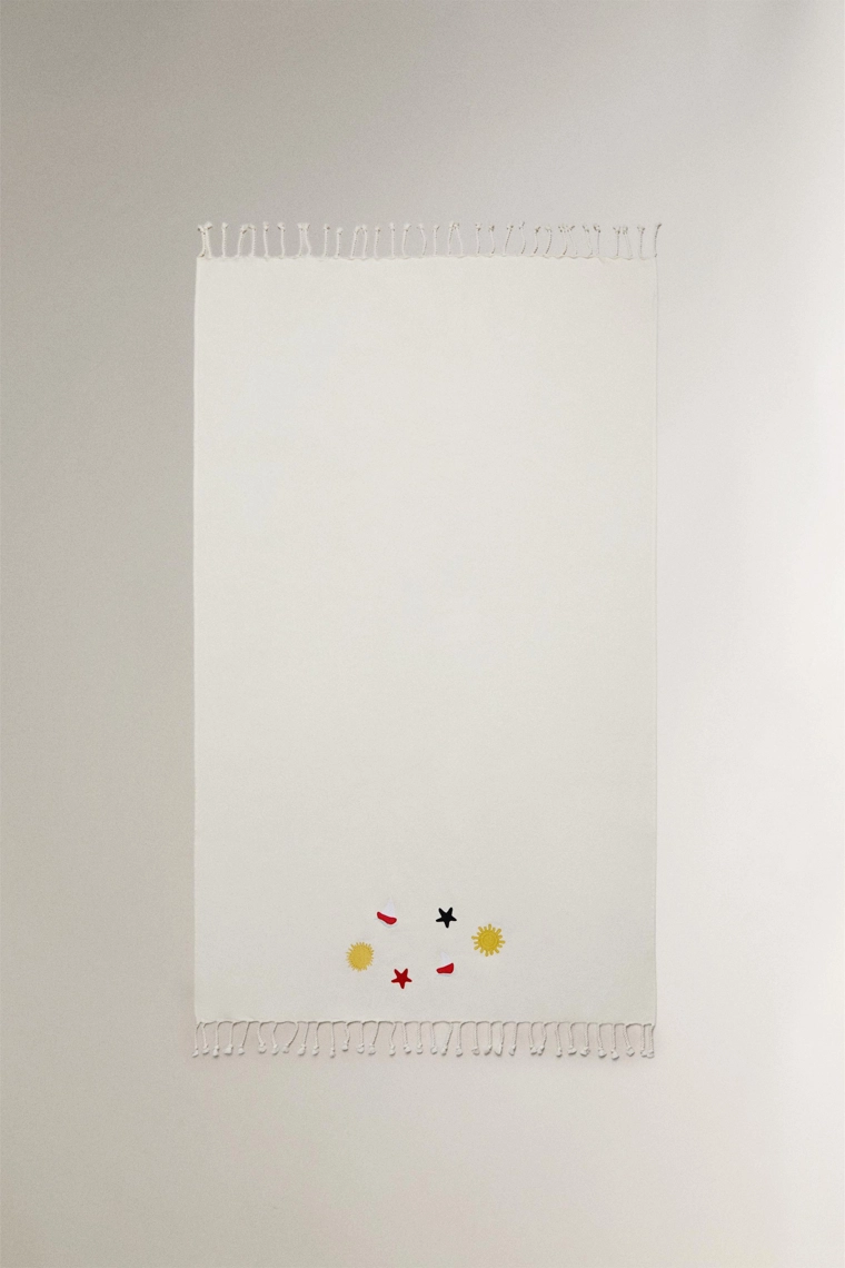 Хлопковое пляжное полотенце с узорами