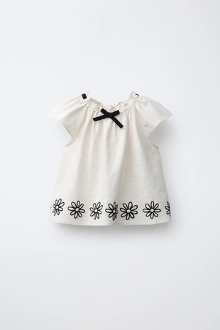 Блуза с цветочной вышивкой- Заказать в России