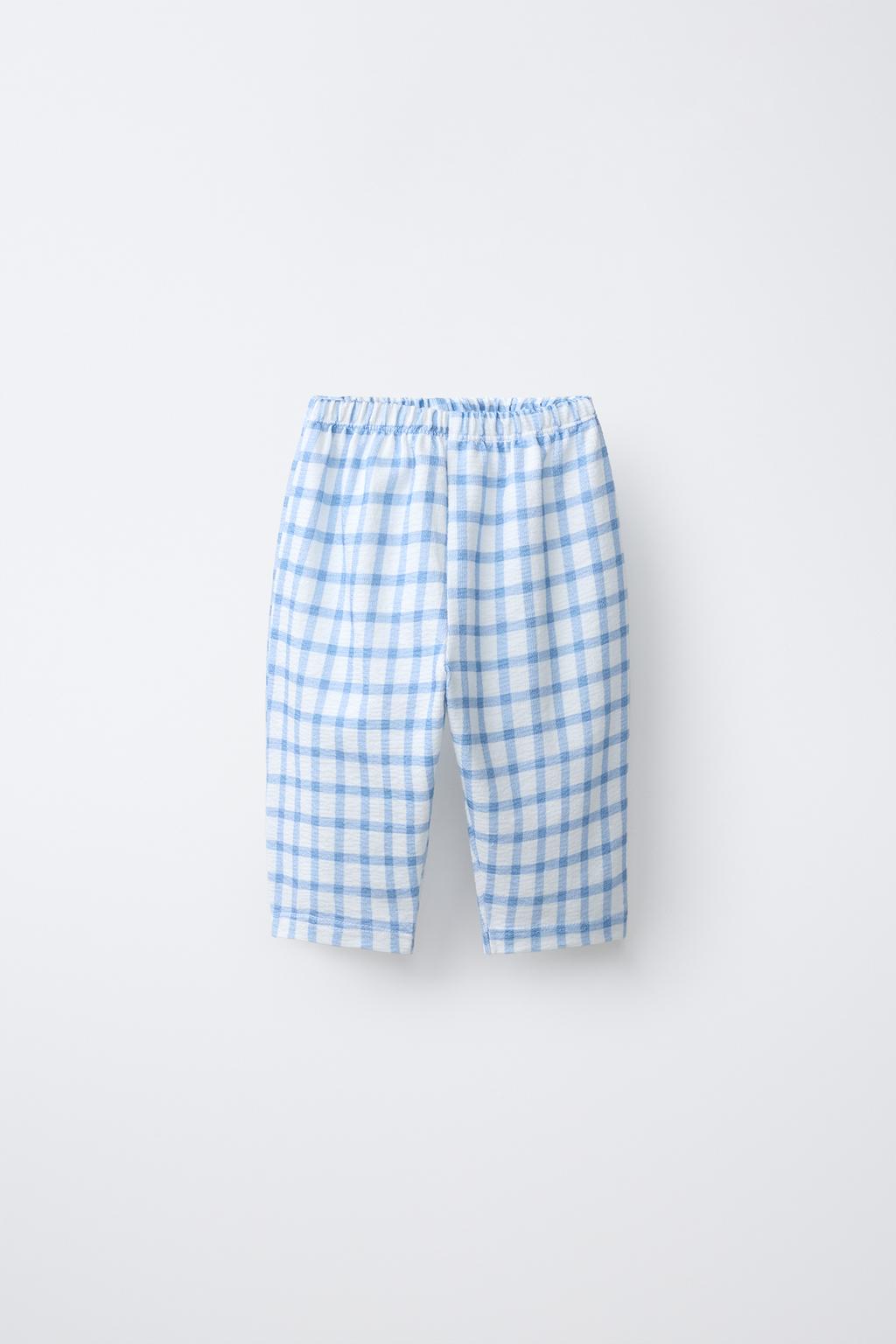 БРЮКИ В КЛЕТКУ С КАРМАНАМИ