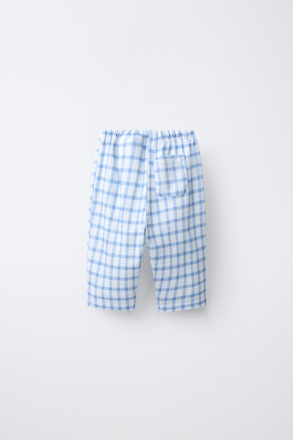 БРЮКИ В КЛЕТКУ С КАРМАНАМИ