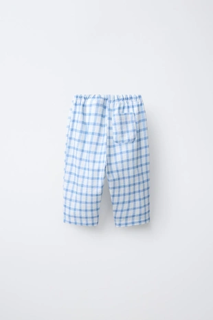 Брюки в клетку с карманами- Заказать в России