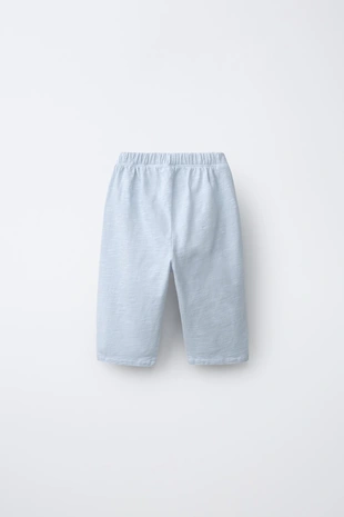 Брюки из комбинированной ткани- Заказать в России