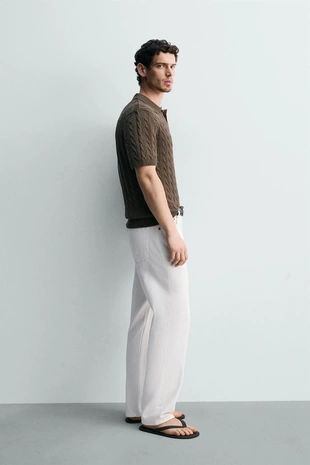 Поло из рельефного трикотажа с косами