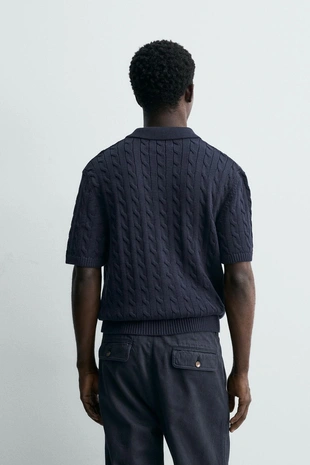 Поло из рельефного трикотажа с косами