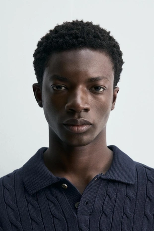 Поло из рельефного трикотажа с косами- Заказать в России