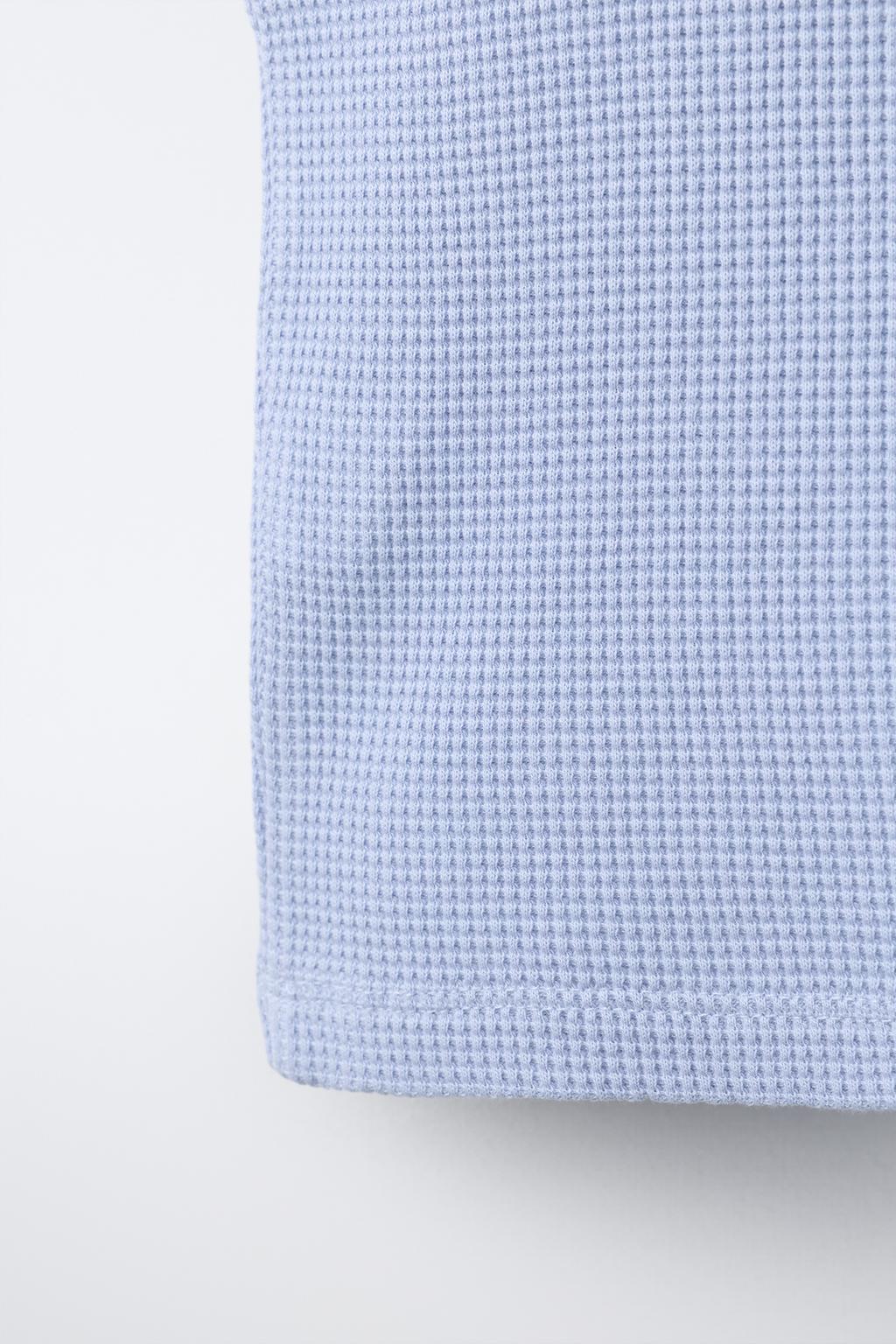 ТОП ИЗ РИФЛЕНОГО ТРИКОТАЖА С НАДПИСЬЮ