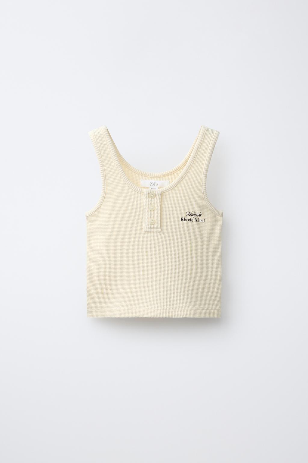 ТОП ИЗ РИФЛЕНОГО ТРИКОТАЖА С НАДПИСЬЮ