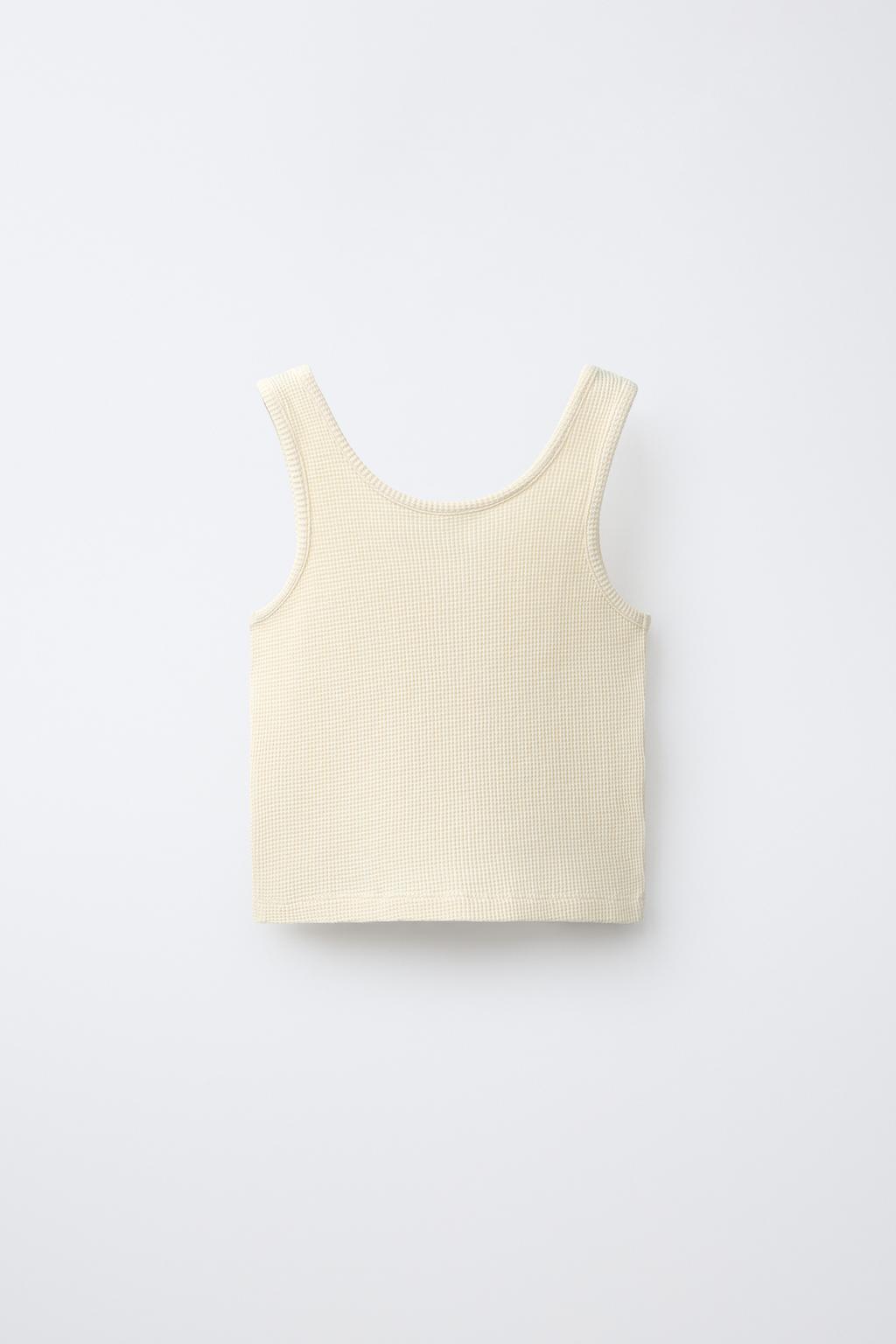 ТОП ИЗ РИФЛЕНОГО ТРИКОТАЖА С НАДПИСЬЮ