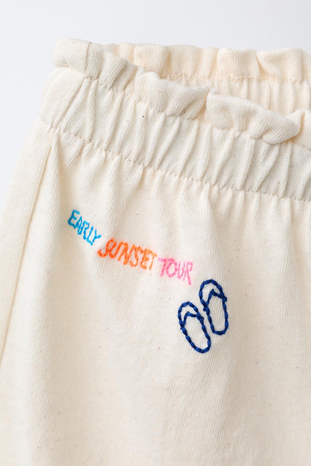 ШОРТЫ С ВОЛАНАМИ И ТРОПИЧЕСКИМ ПРИНТОМ