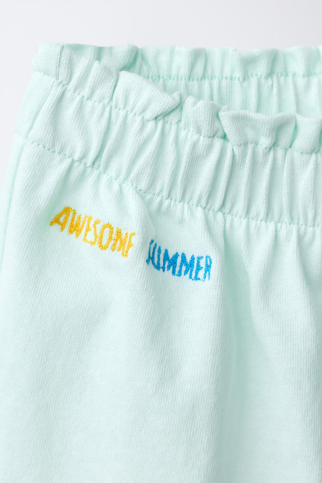 ШОРТЫ С ВОЛАНАМИ И ТРОПИЧЕСКИМ ПРИНТОМ