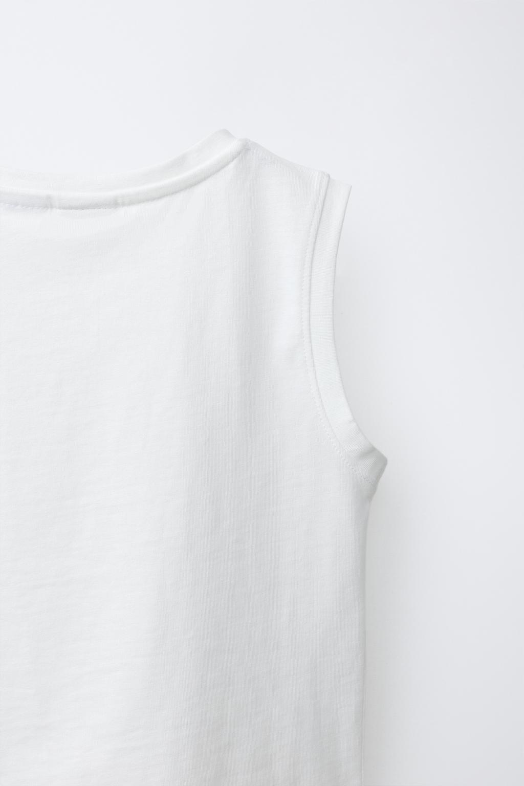 ОДНОТОННАЯ ФУТБОЛКА С КАРМАНОМ