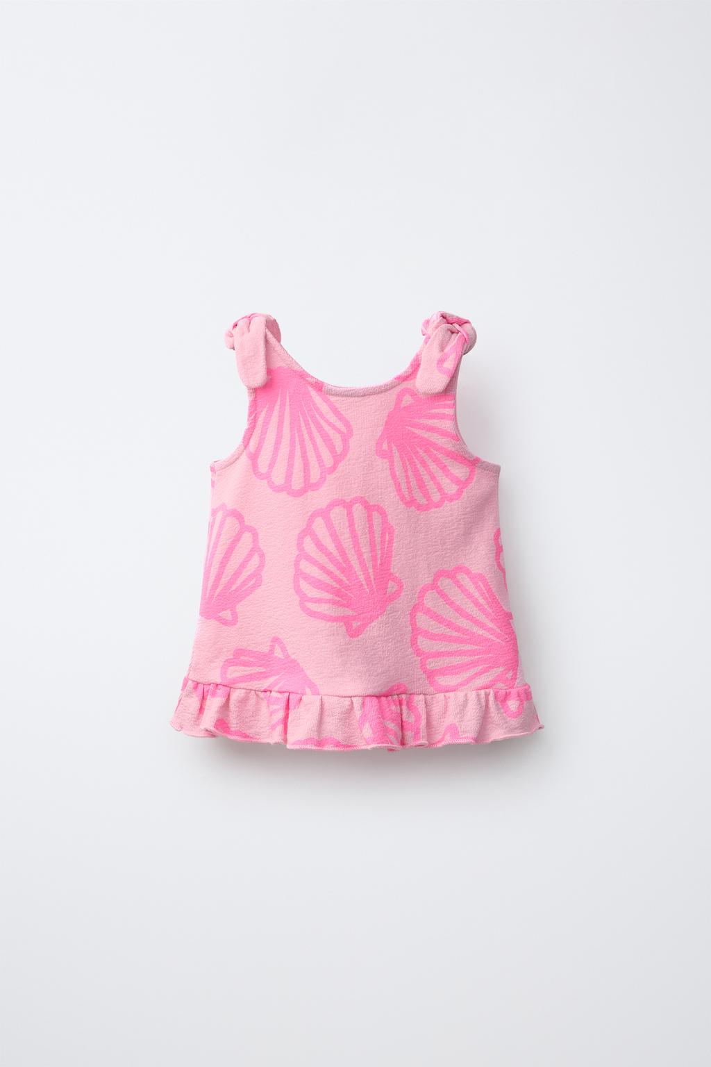 ФУТБОЛКА С УЗЕЛКАМИ И ФЛУОРЕСЦЕНТНЫМИ РАКОВИНАМИ