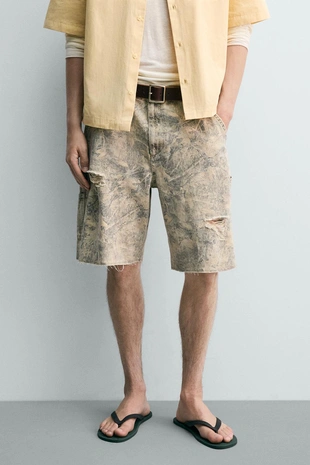 Шорты  с абстрактным принтом и эффектом потертости- Заказать в России