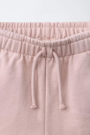 Шорты из мягкой ткани с нашивкой «звезда»- Заказать в России