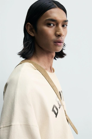 Футболка свободного кроя с эффектом винтажной потертости- Заказать в России