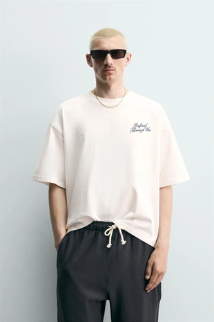 Футболка свободного кроя с принтом- Заказать в России