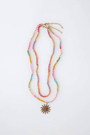 Набор из двух бус и колье с подвеской в виде солнца- Заказать в России