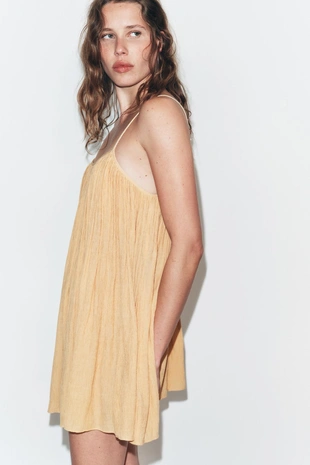 Мини-платье фактурного объемного кроя