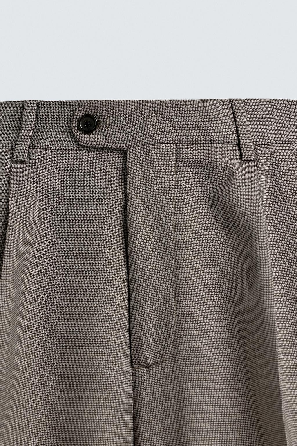 БРЮКИ КОСТЮМНЫЕ В КЛЕТКУ СО СКЛАДКАМИ